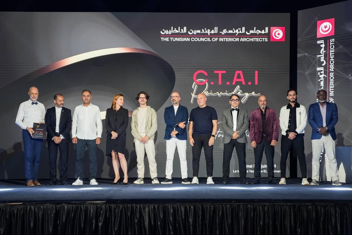 Delegates from Mediterranean interior-design associations standing together on stage at CTAI Privilege in Hammamet.