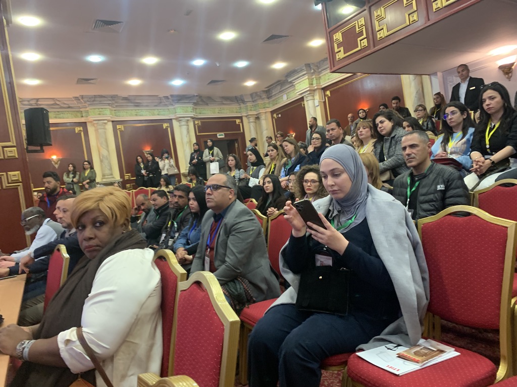 Audience members following the international programme in Hammamet.