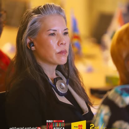 A participant following the multilingual Build in Africa discussion.